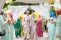 Malay Wedding. A malaysian couple newly wedding holding hands.